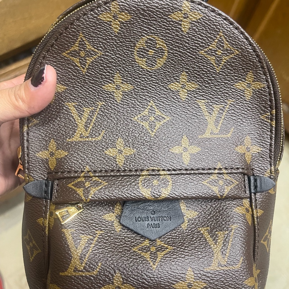 Palm spring mini like new comes with receipt and dust bag